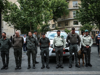 People are standing still as a siren sounds, marking Israel's Memorial Day, when the country commemorates fallen soldiers of Israel's wars a...