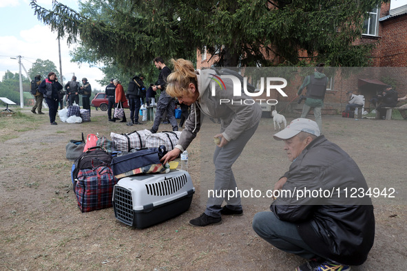 Civilians are being evacuated from the city of Vovchansk, which is constantly subjected to Russian shelling, in the Kharkiv region, northeas...