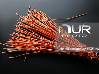 Copper wire is being recovered at a scrap metal recycling station in Yichang, Hubei Province, China, on May 13, 2024. (