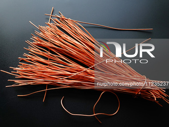 Copper wire is being recovered at a scrap metal recycling station in Yichang, Hubei Province, China, on May 13, 2024. (