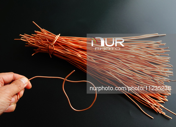 Copper wire is being recovered at a scrap metal recycling station in Yichang, Hubei Province, China, on May 13, 2024. 