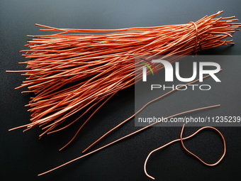 Copper wire is being recovered at a scrap metal recycling station in Yichang, Hubei Province, China, on May 13, 2024. (