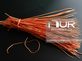 Copper wire is being recovered at a scrap metal recycling station in Yichang, Hubei Province, China, on May 13, 2024. (