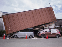 Collapsed houses and damaged cars are seen in the eastern Kumamoto suburb of Mashiki and neighboring areas, one month after a series of deva...