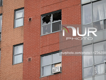 A broken window is visible at the apartment unit where a fire is currently under investigation. The fire, which broke out in Etobicoke, Toro...