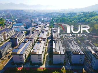 Photovoltaic panels are being seen on the roofs of enterprises in Lianyun township, Anqing city, Anhui province, China, on May 14, 2024. (