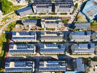 Photovoltaic panels are being seen on the roofs of enterprises in Lianyun township, Anqing city, Anhui province, China, on May 14, 2024. (