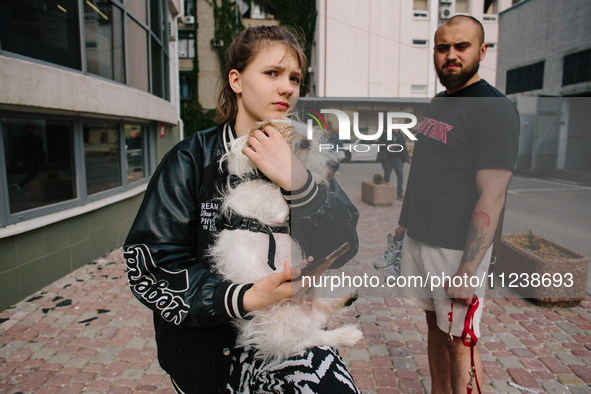 People whose homes are being damaged by an airstrike  in Kharkiv, Ukraine, on May 14, 2024. Russia struck Kharkiv with guided aerial bombs....