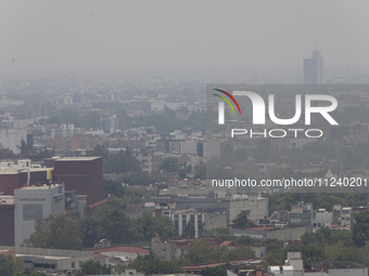 A general view of Mexico City is showing after the Phase 1 environmental contingency alert is registered due to the high levels of pollution...