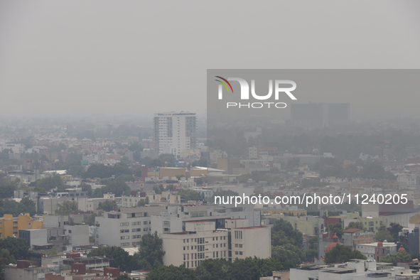 A general view of Mexico City is showing after the Phase 1 environmental contingency alert is registered due to the high levels of pollution...