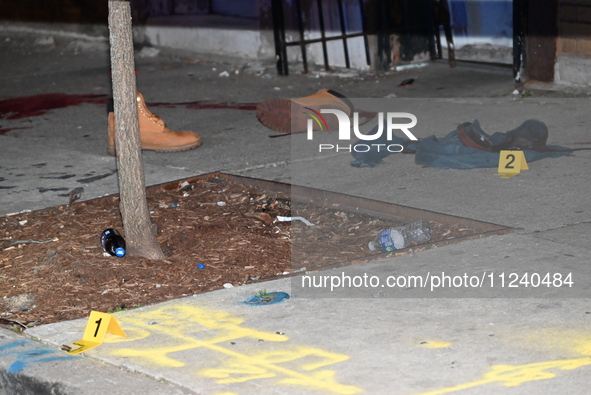 Evidence including footwear, clothes, and blood is at the crime scene. A 33-year-old male is being shot in Chicago, Illinois, United States,...