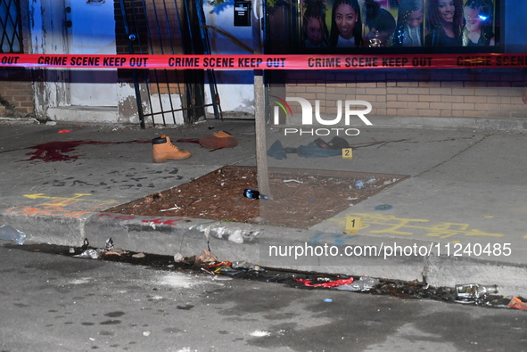 Evidence including footwear, clothes, and blood is at the crime scene. A 33-year-old male is being shot in Chicago, Illinois, United States,...