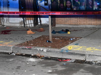 Evidence including footwear, clothes, and blood is at the crime scene. A 33-year-old male is being shot in Chicago, Illinois, United States,...