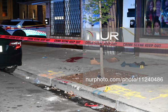 Evidence including footwear, clothes, and blood is at the crime scene. A 33-year-old male is being shot in Chicago, Illinois, United States,...