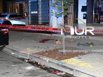 Evidence including footwear, clothes, and blood is at the crime scene. A 33-year-old male is being shot in Chicago, Illinois, United States,...