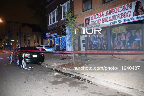 Evidence including footwear, clothes, and blood is at the crime scene. A 33-year-old male is being shot in Chicago, Illinois, United States,...