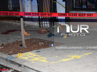 Evidence including footwear, clothes, and blood is at the crime scene. A 33-year-old male is being shot in Chicago, Illinois, United States,...