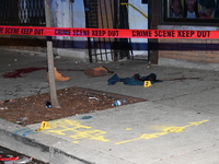 Evidence including footwear, clothes, and blood is at the crime scene. A 33-year-old male is being shot in Chicago, Illinois, United States,...