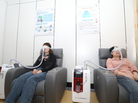 Patients are having their eyes fumigated with traditional Chinese medicine at the ophthalmology department of Shaoxing Central Hospital in S...