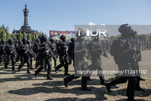 Indonesian special forces of anti-terror military personnel are marching during a security assembly ahead of The 10th World Water Forum 2024...