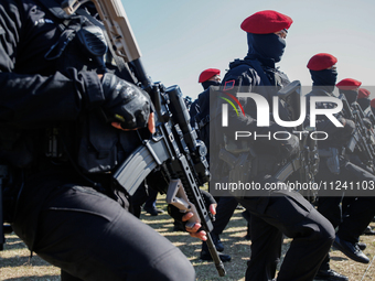 Indonesian special forces commando army (Kopassus) personnel are taking part during a security assembly ahead of The 10th World Water Forum...