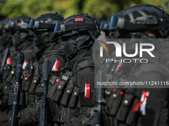 Indonesian elite mobile brigade police are taking part during a security assembly ahead of The 10th World Water Forum 2024 in Denpasar, Bali...