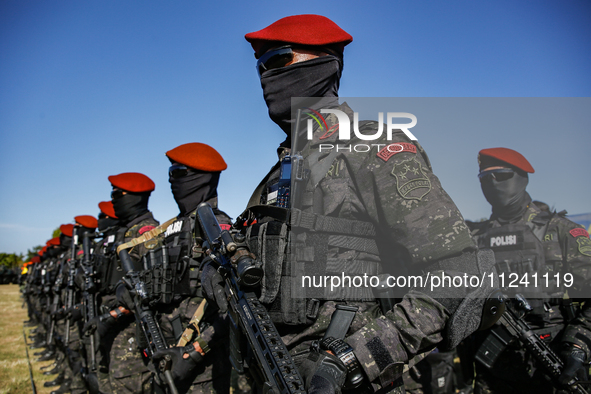 Indonesian anti-terror squad police are taking part during a security assembly ahead of The 10th World Water Forum 2024 in Denpasar, Bali, I...