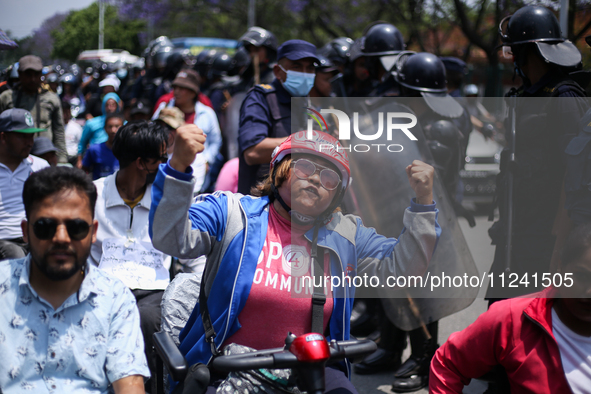 Nepali wheelchair users are rallying on the roads of Kathmandu, Nepal, on May 15, 2024, demanding the government address their demand for eq...