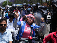 Nepali wheelchair users are rallying on the roads of Kathmandu, Nepal, on May 15, 2024, demanding the government address their demand for eq...