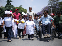 Nepali wheelchair users are rallying on the roads of Kathmandu, Nepal, on May 15, 2024, demanding the government address their demand for eq...