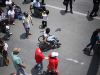 Nepali wheelchair users are rallying on the roads of Kathmandu, Nepal, on May 15, 2024, demanding the government address their demand for eq...