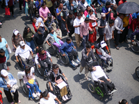 Nepali wheelchair users are rallying on the roads of Kathmandu, Nepal, on May 15, 2024, demanding the government address their demand for eq...