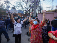 Supporters and fans of Sandeep Lamichhane are reacting and celebrating outside the Patan High Court after hearing the news of acquittal from...