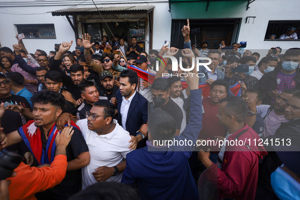 Supporters and fans of Sandeep Lamichhane are reacting and celebrating outside the Patan High Court after hearing the news of acquittal from...