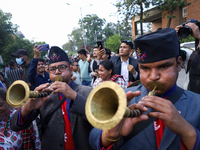 Supporters and fans of Sandeep Lamichhane are reacting and celebrating outside the Patan High Court after hearing the news of acquittal from...