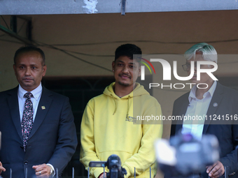 Sandeep Lamichhane (center), Nepal's leg-spinner cricketer, is attending a briefing alongside his legal team after being acquitted in a rape...