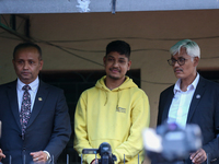 Sandeep Lamichhane (center), Nepal's leg-spinner cricketer, is attending a briefing alongside his legal team after being acquitted in a rape...