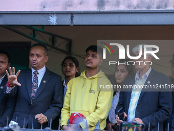 Sandeep Lamichhane (center), Nepal's leg-spinner cricketer, is attending a briefing alongside his legal team after being acquitted in a rape...