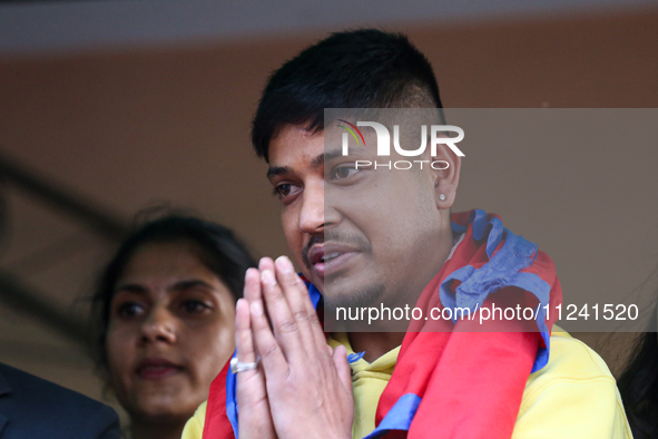 Sandeep Lamichhane, Nepal's leg-spinner cricketer, is greeting media and supporters after being acquitted in a rape case from the Patan High...