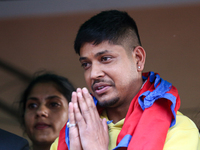 Sandeep Lamichhane, Nepal's leg-spinner cricketer, is greeting media and supporters after being acquitted in a rape case from the Patan High...