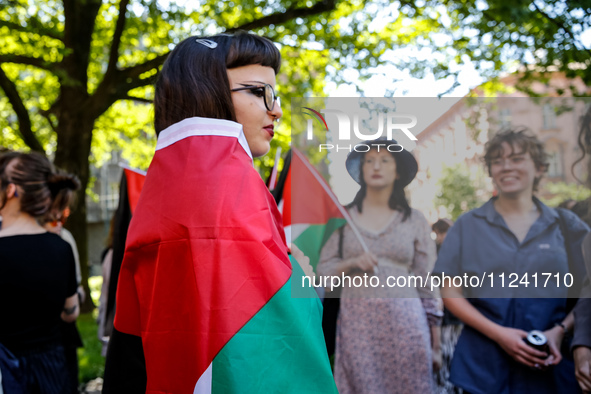 Students of Jagiellonia University  chant pro-Palestine slogans and hold Palestinian flags during academia demonstration against Israeli act...