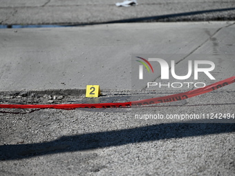 Evidence markers are highlighting where shell casings are being discovered. Two people are in critical condition after being shot in Chicago...