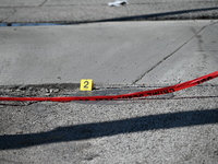 Evidence markers are highlighting where shell casings are being discovered. Two people are in critical condition after being shot in Chicago...