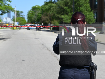 Chicago police are investigating the shooting scene. Two people are in critical condition after being shot in Chicago, Illinois, United Stat...