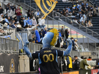 Philadelphia Union's mascot Phang is warming up Philadelphia Union fans in the Sons of Ben section during the Philadelphia Union vs. New Yor...