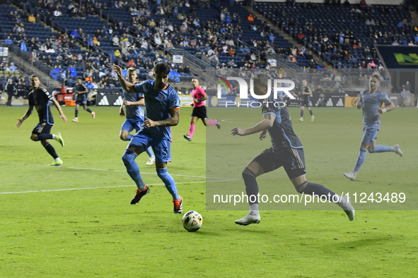 NYC FC's Defender Thiago Martins and Philadelphia Union's Forward Michael Uhre are in action during the second half of the Philadelphia Unio...