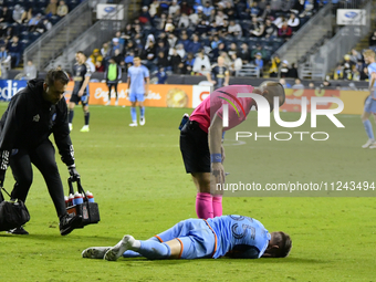 NYC FC's defender Mitja Ilenic is receiving on-field medical attention in the second half of the Philadelphia Union vs. New York City FC mat...