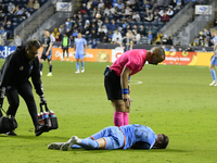 NYC FC's defender Mitja Ilenic is receiving on-field medical attention in the second half of the Philadelphia Union vs. New York City FC mat...