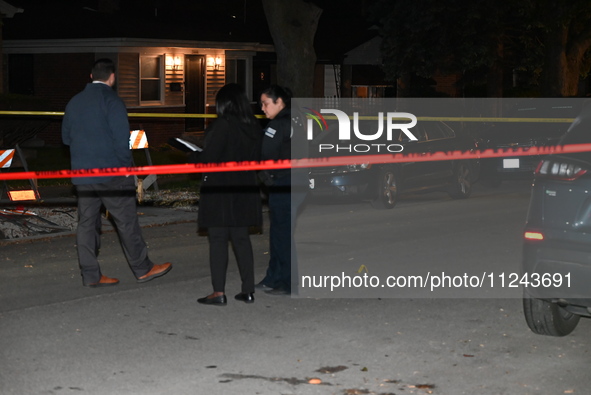 Chicago police officers are at the crime scene. A 38-year-old male victim is being shot multiple times while inside a vehicle and is being p...