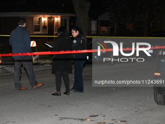 Chicago police officers are at the crime scene. A 38-year-old male victim is being shot multiple times while inside a vehicle and is being p...